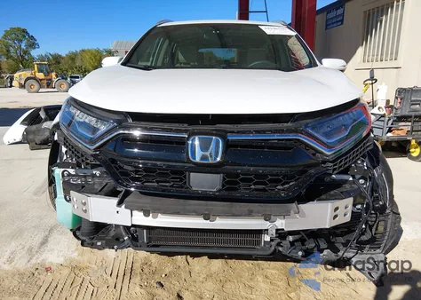 2021 Honda Cr-V Hybrid Touring z USA, uszkodzony, nr VIN 7FART6H9XME020353